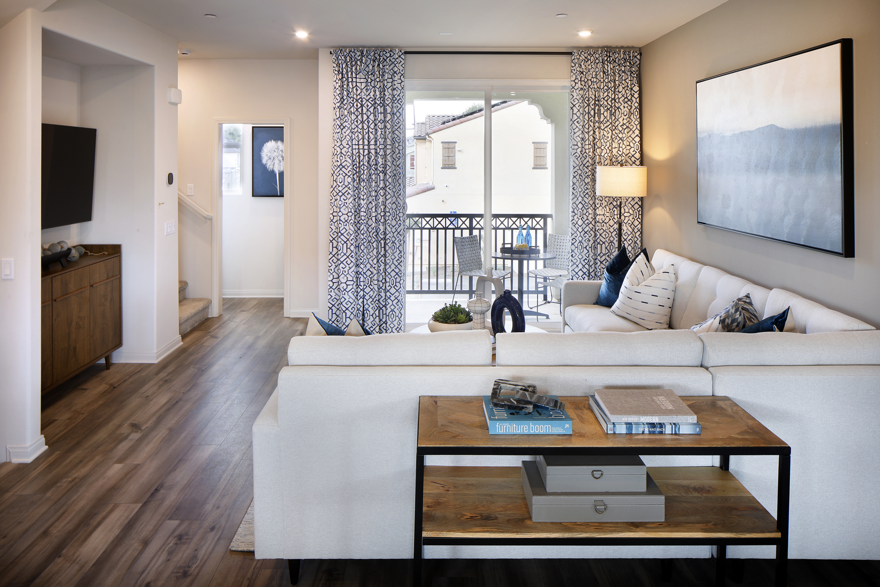 A living room with a large window.