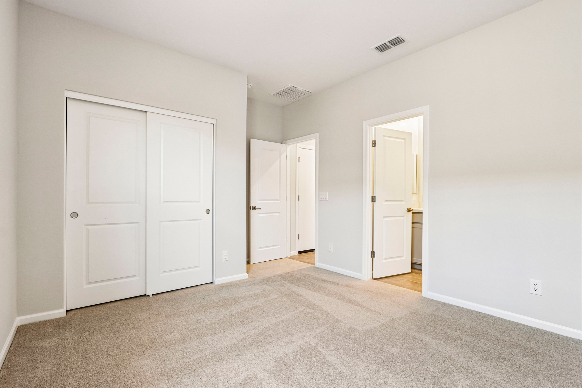 A room with white doors.