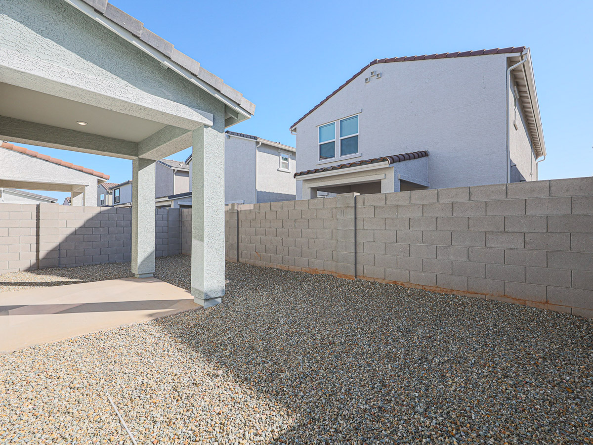 A building with a stone wall.