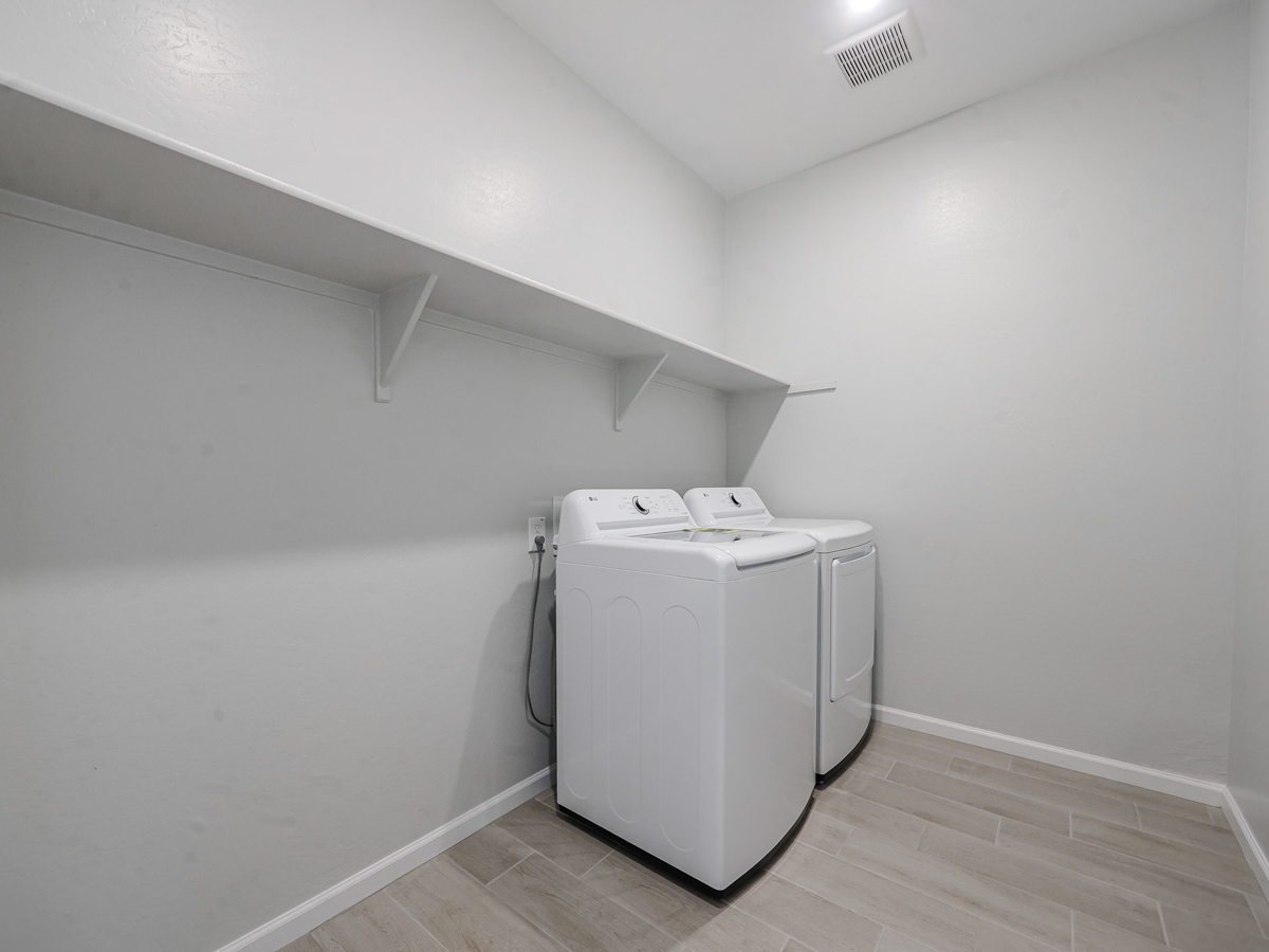 A white machine in a room.