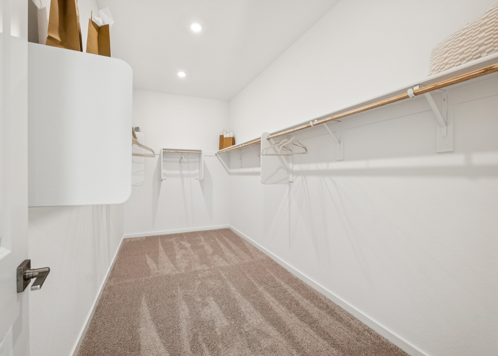 A white bathroom with a white shower.