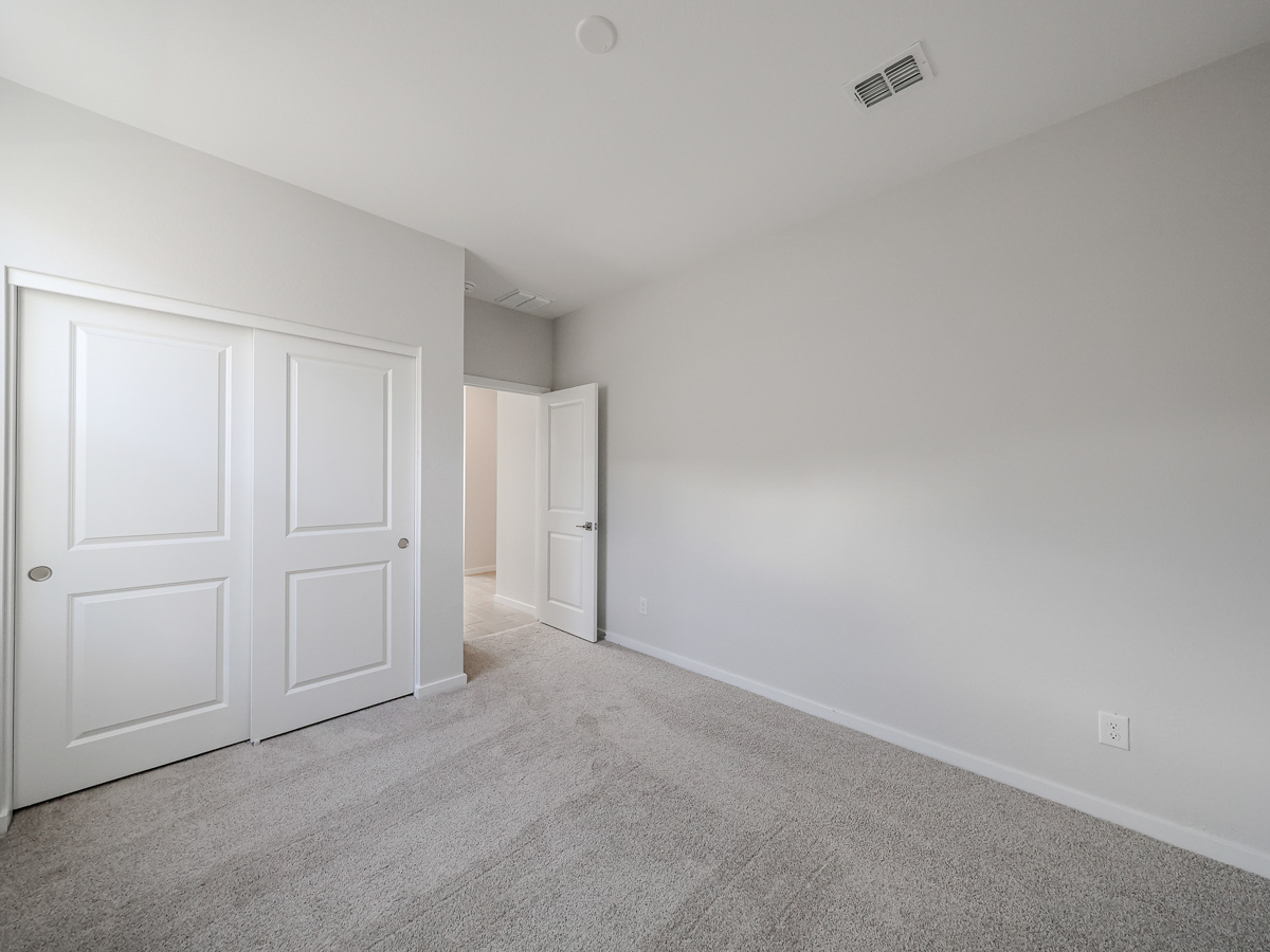 A room with white doors.