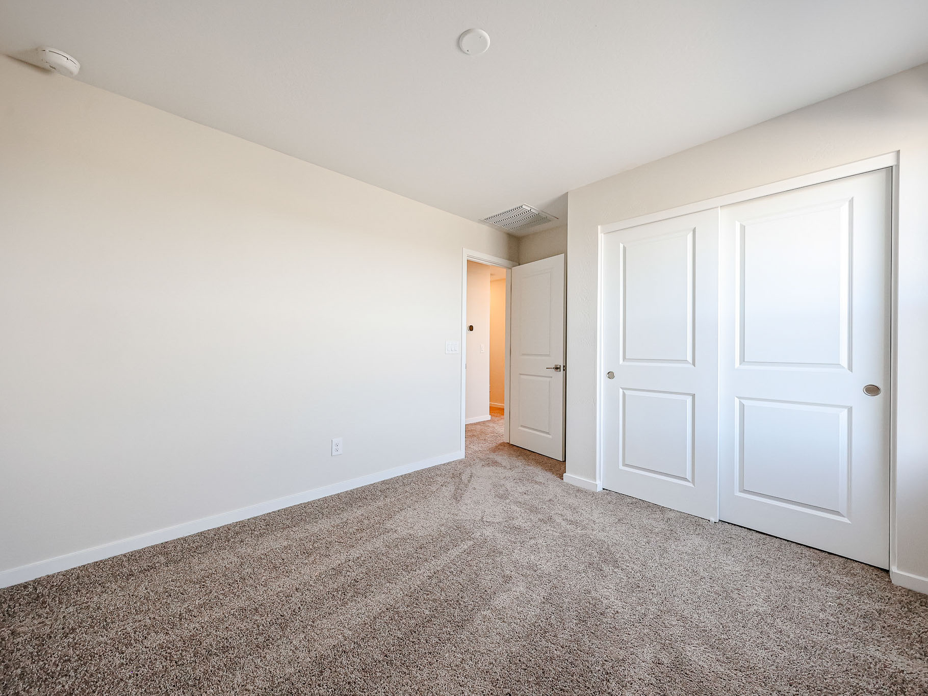 A room with white doors.