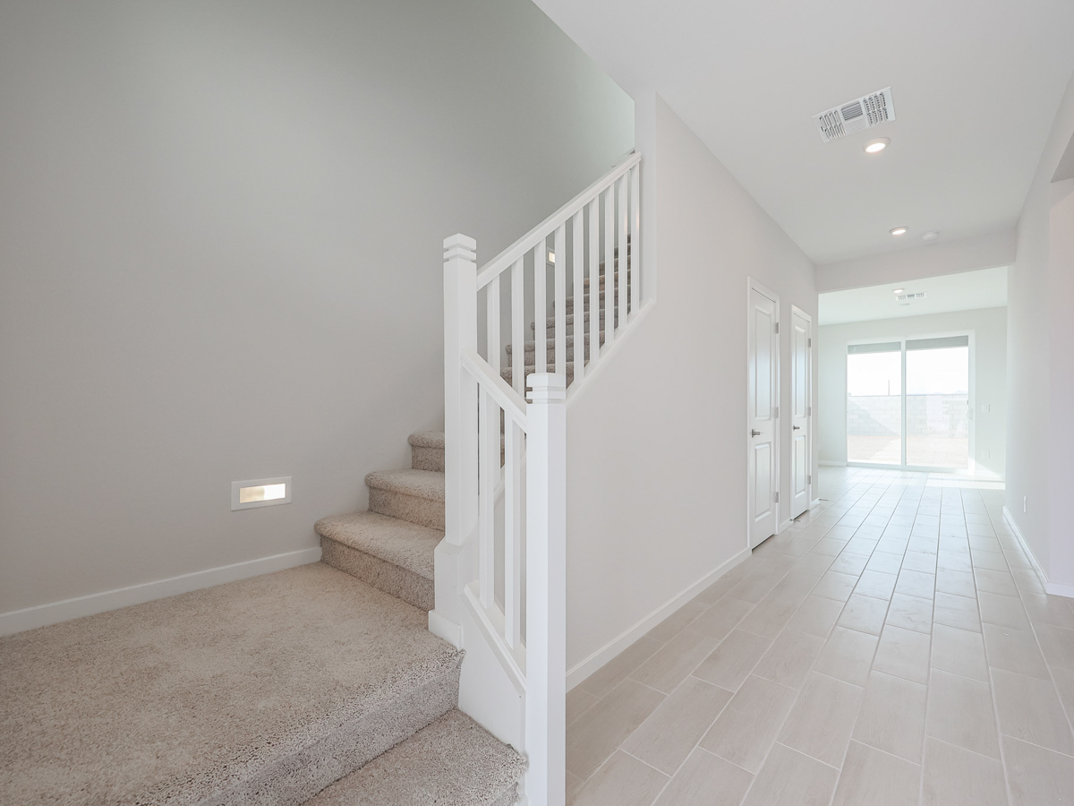 A white staircase in a house.