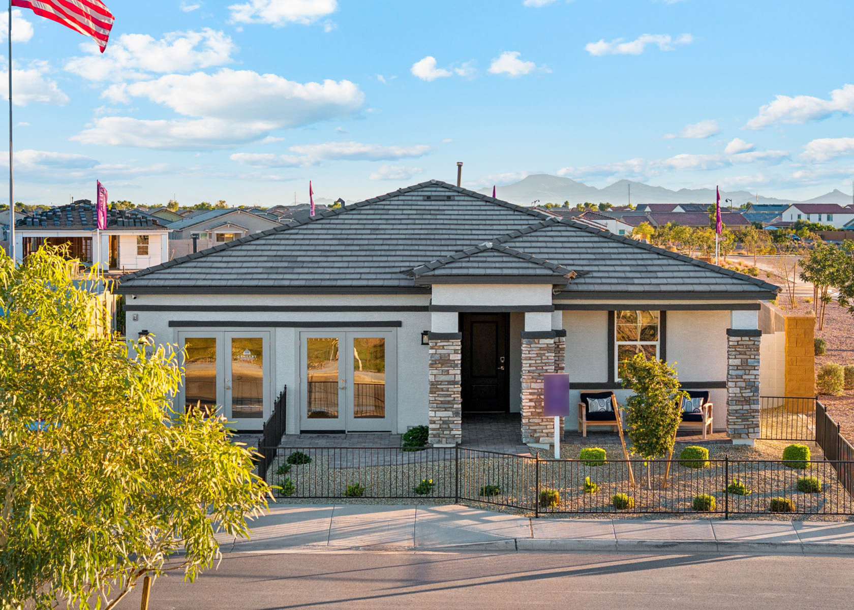 A house with a fence around it.