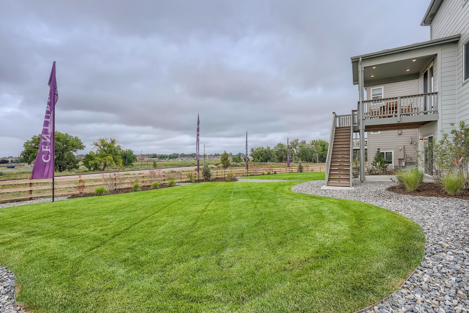 A grassy area next to a building.