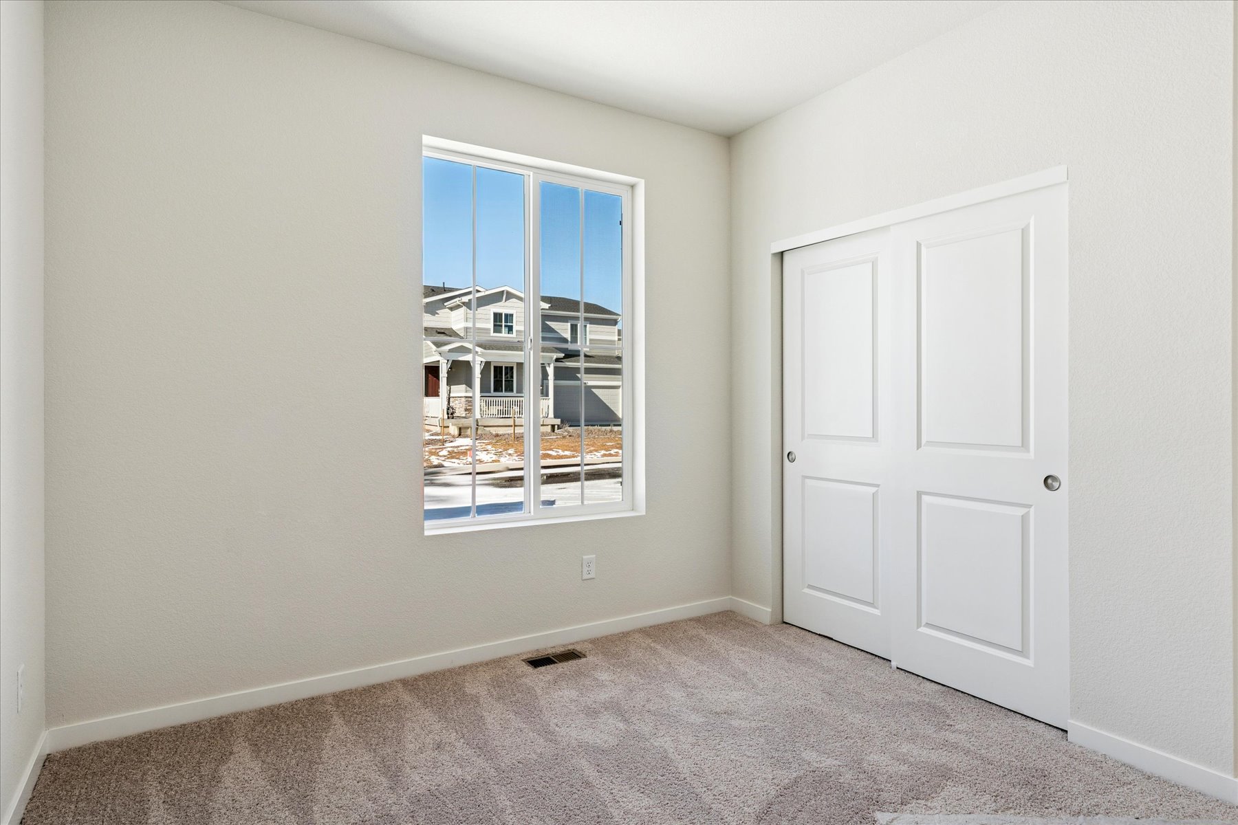 A room with white doors.