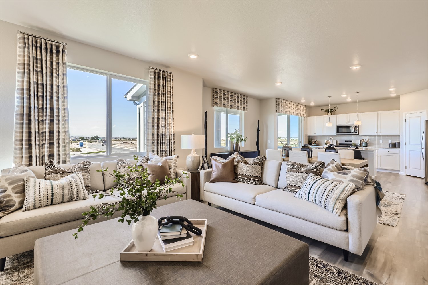 A living room with a large window.