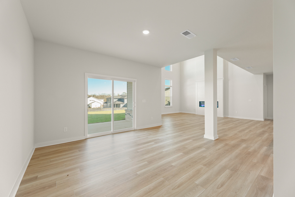 A room with a wood floor and a wood floor.