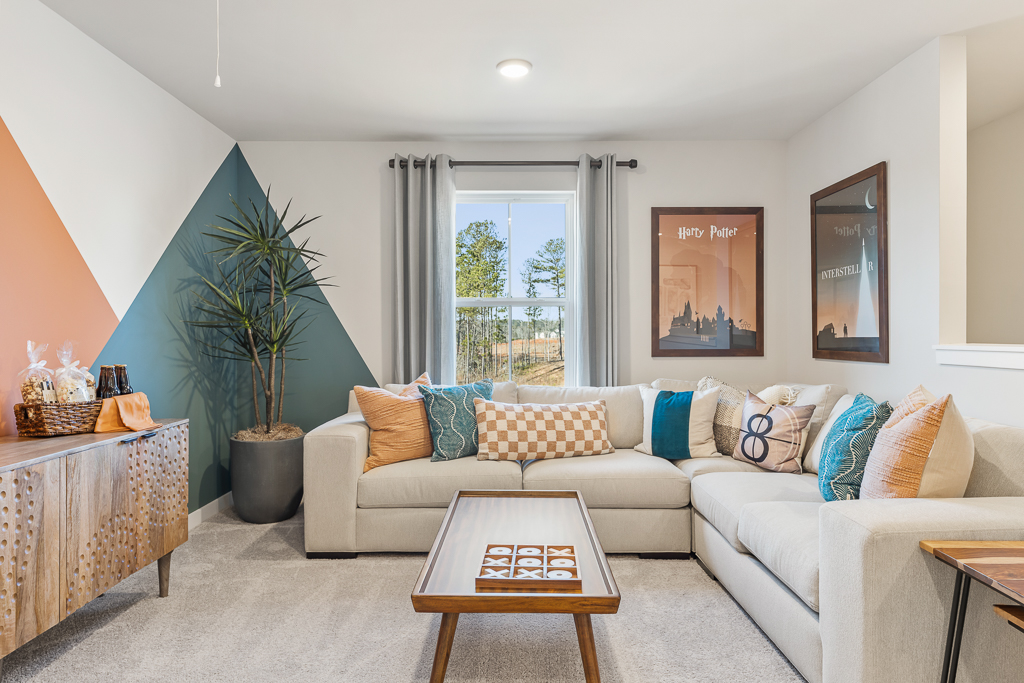 A living room with a couch and a coffee table.