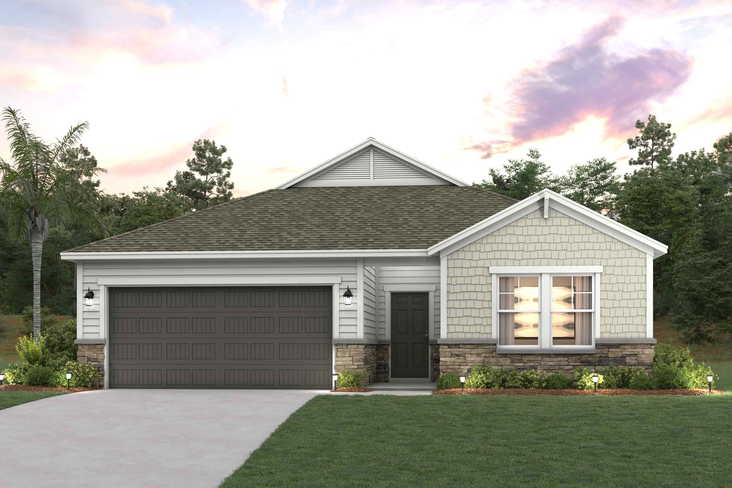 A house with a garage and a lawn in front of it.