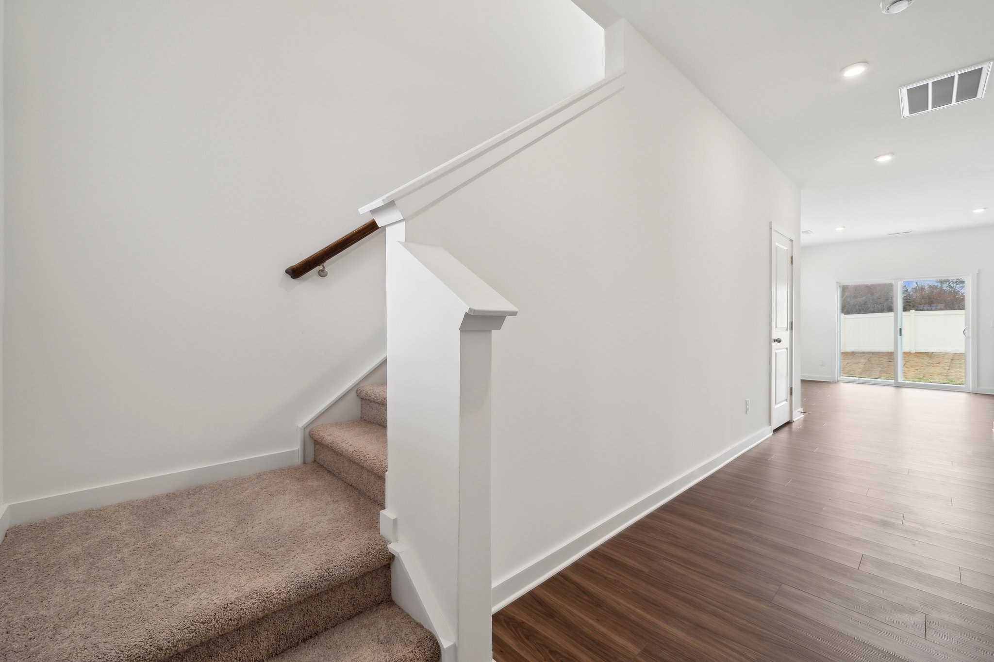 A white staircase in a house.
