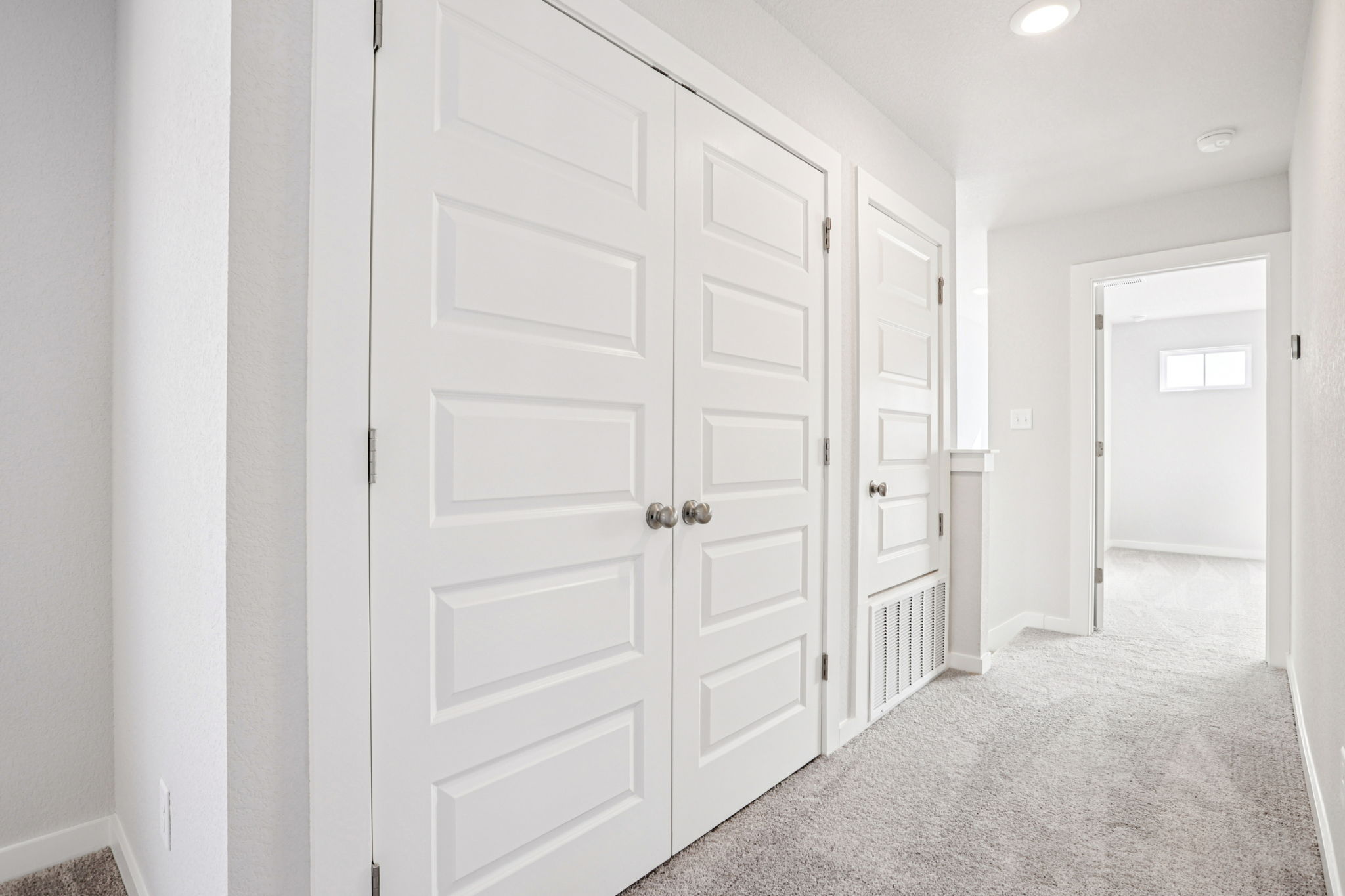 A room with white doors.