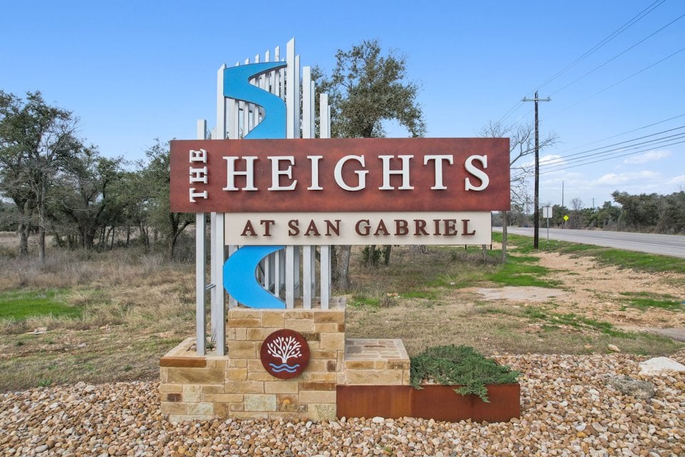 A sign on the side of a road.