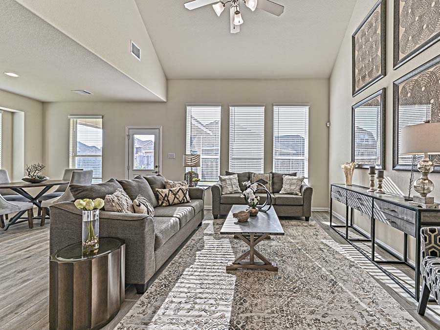 A living room with a couch and coffee table.
