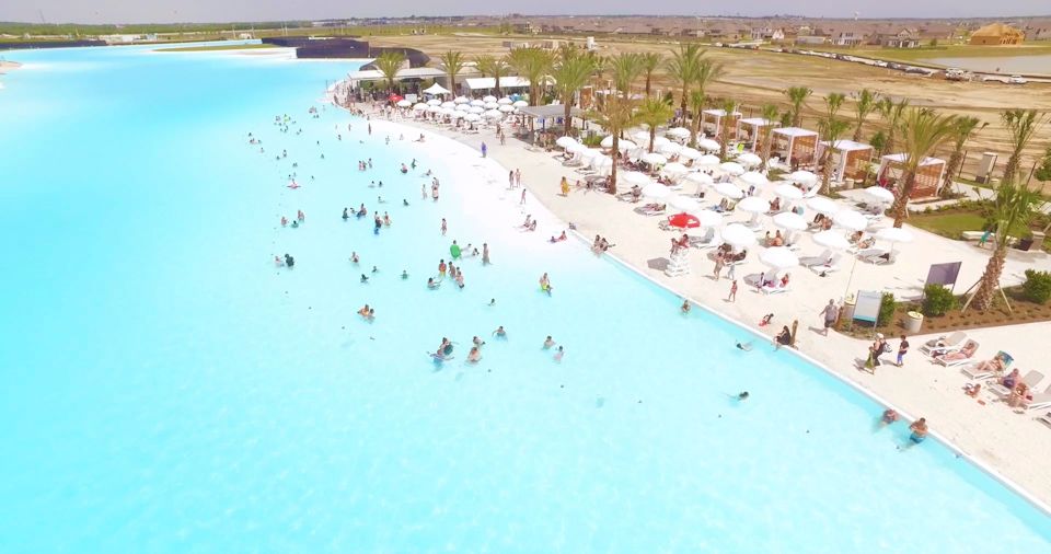 A large group of people in a pool.