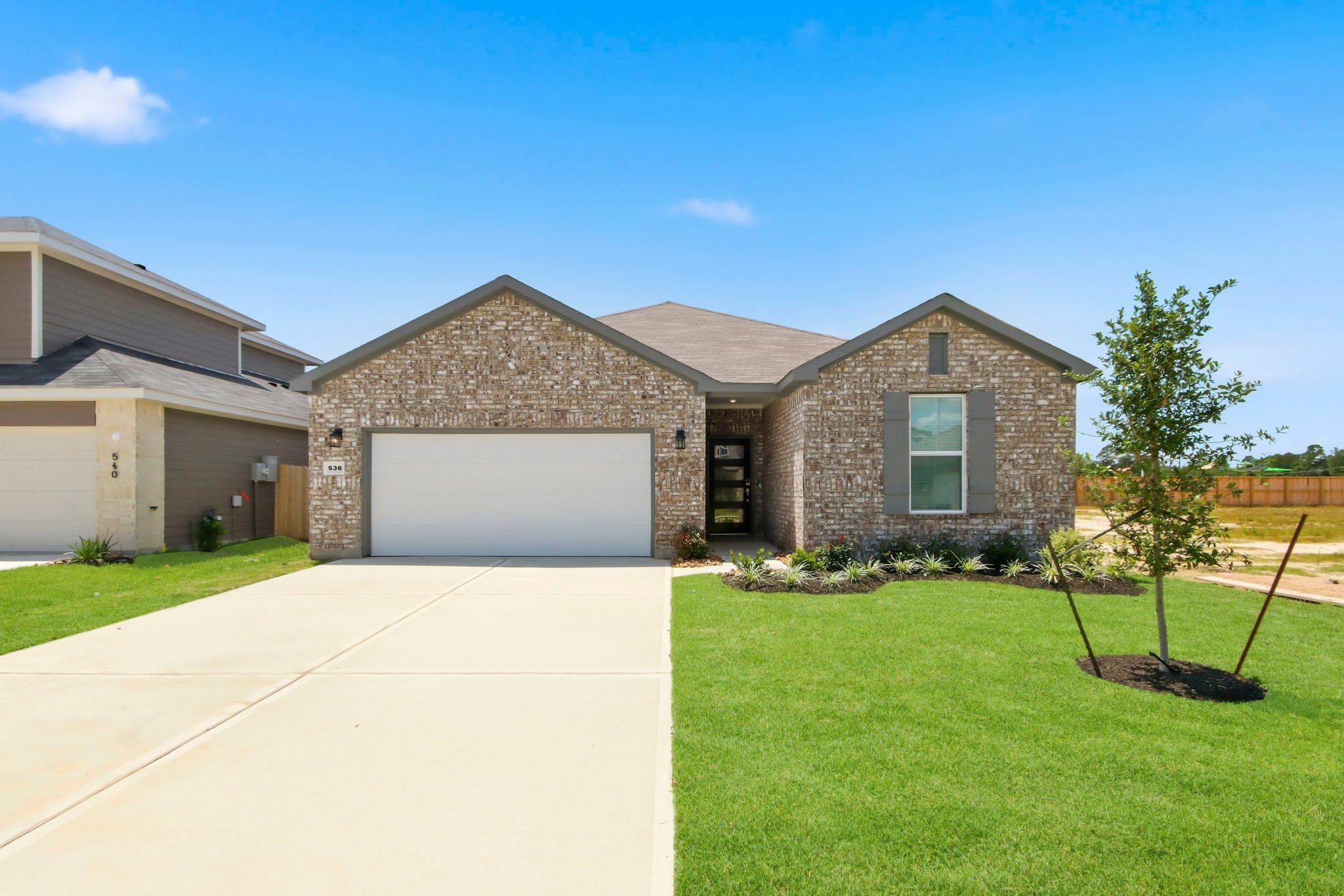 A house with a driveway.
