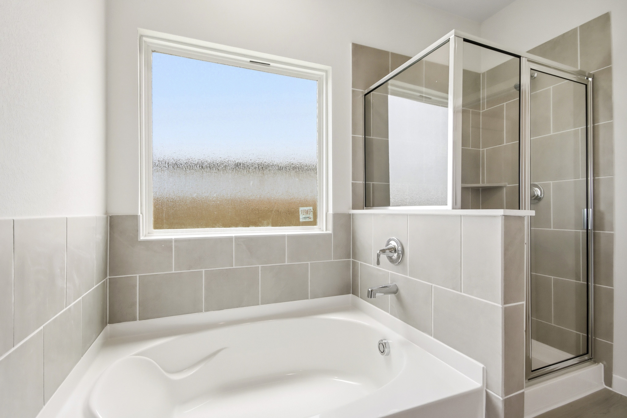 A bathroom with a glass shower.