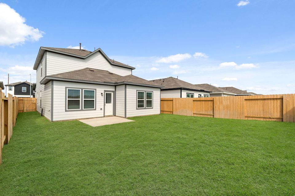 A house with a fence around it.