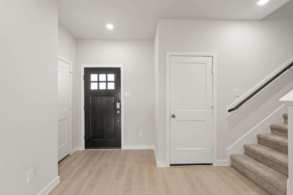 A room with white doors.
