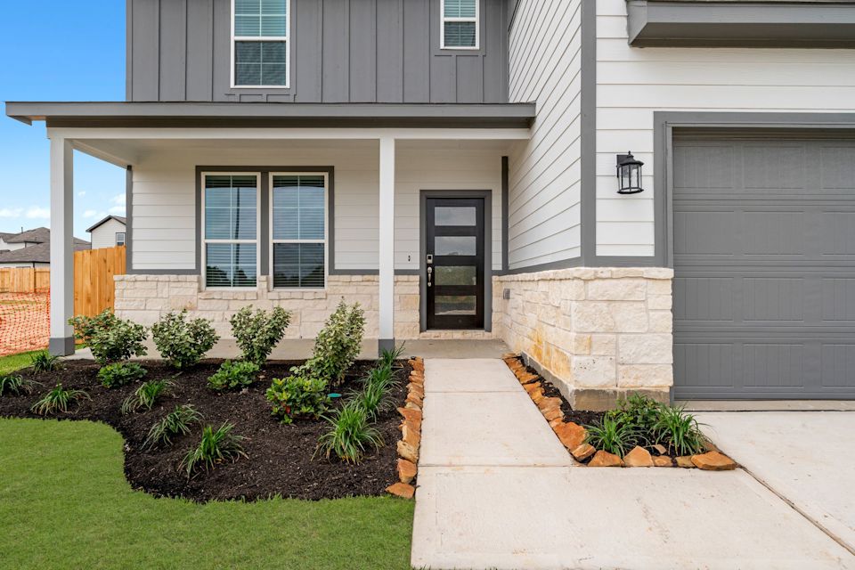 A house with a front yard.
