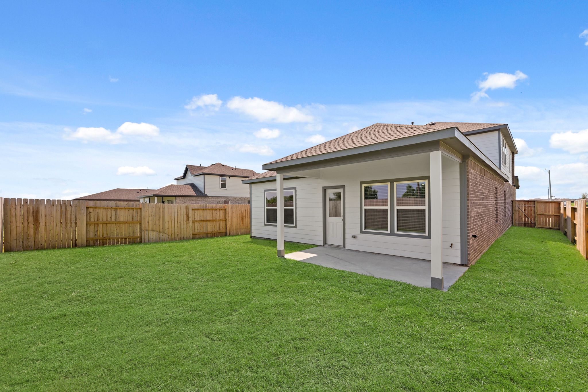A house with a fence around it.