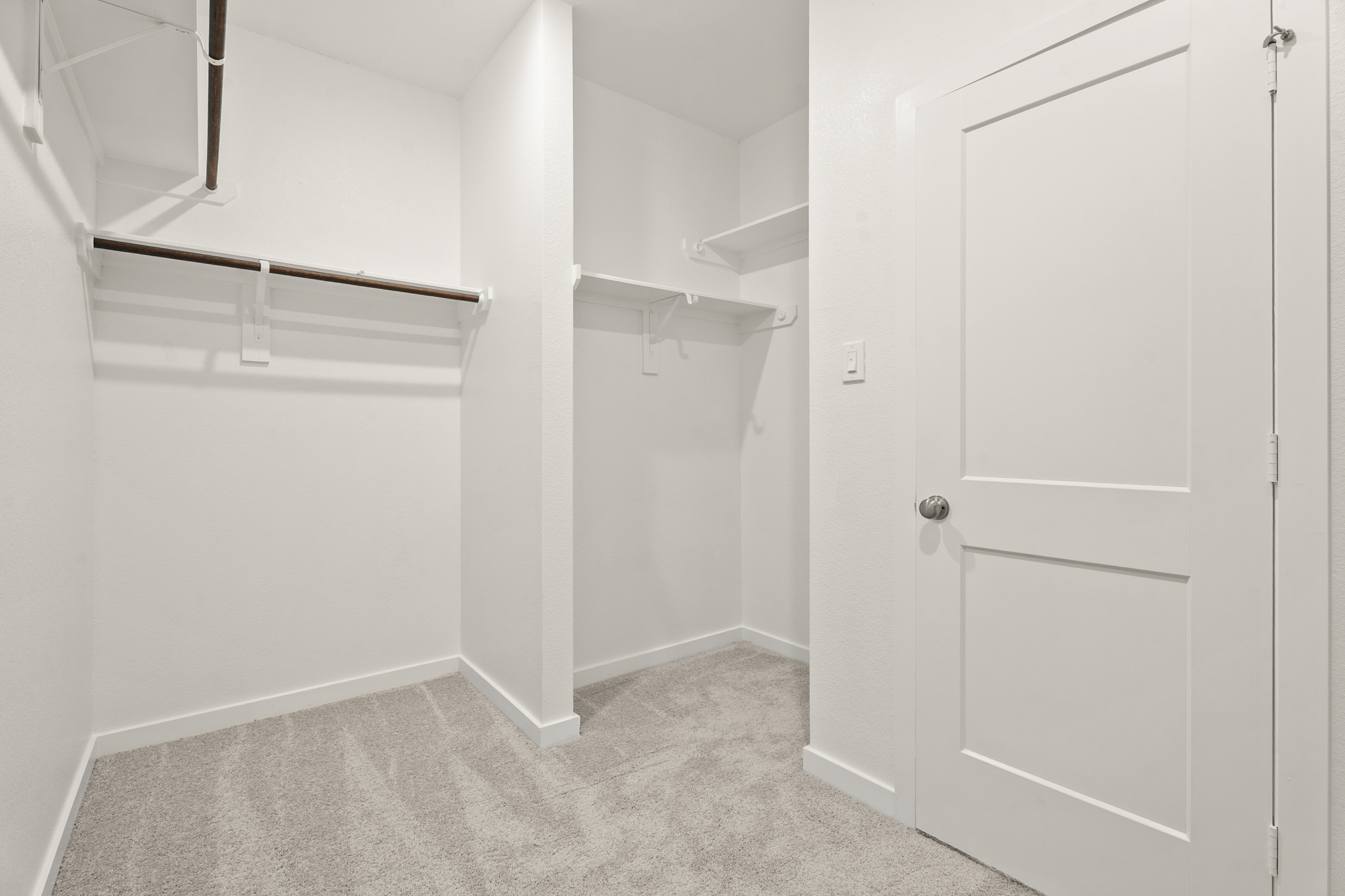 A room with white doors.