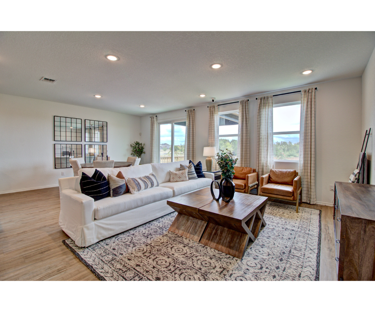 A living room with a couch and a coffee table.