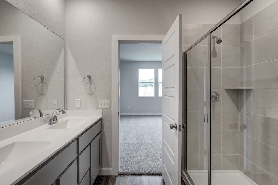 A bathroom with a glass shower.