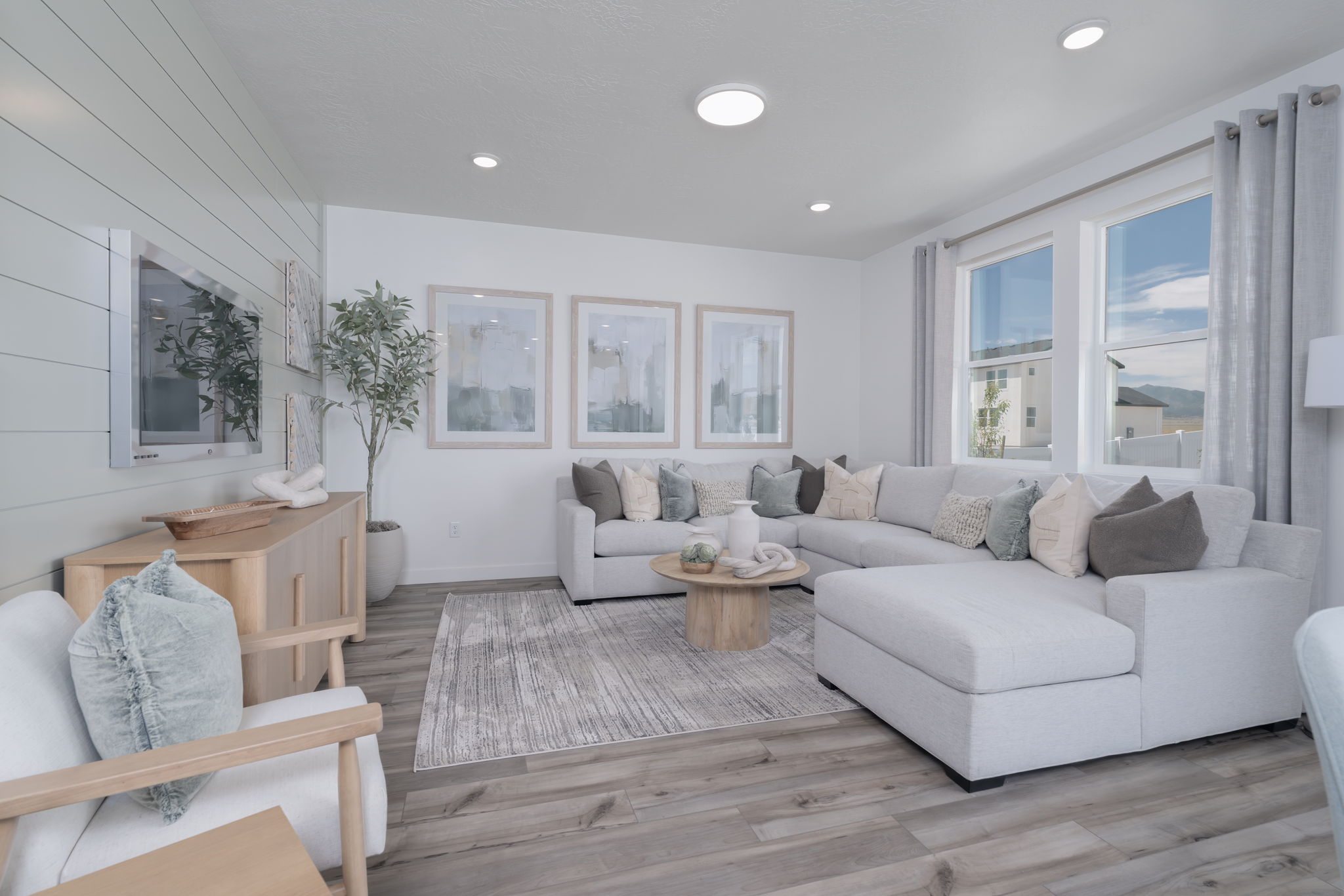 A living room with a couch and a table.