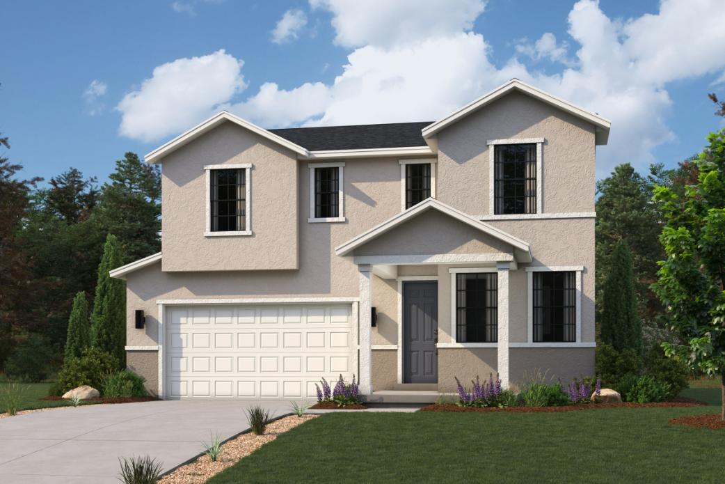 A white house with a driveway.