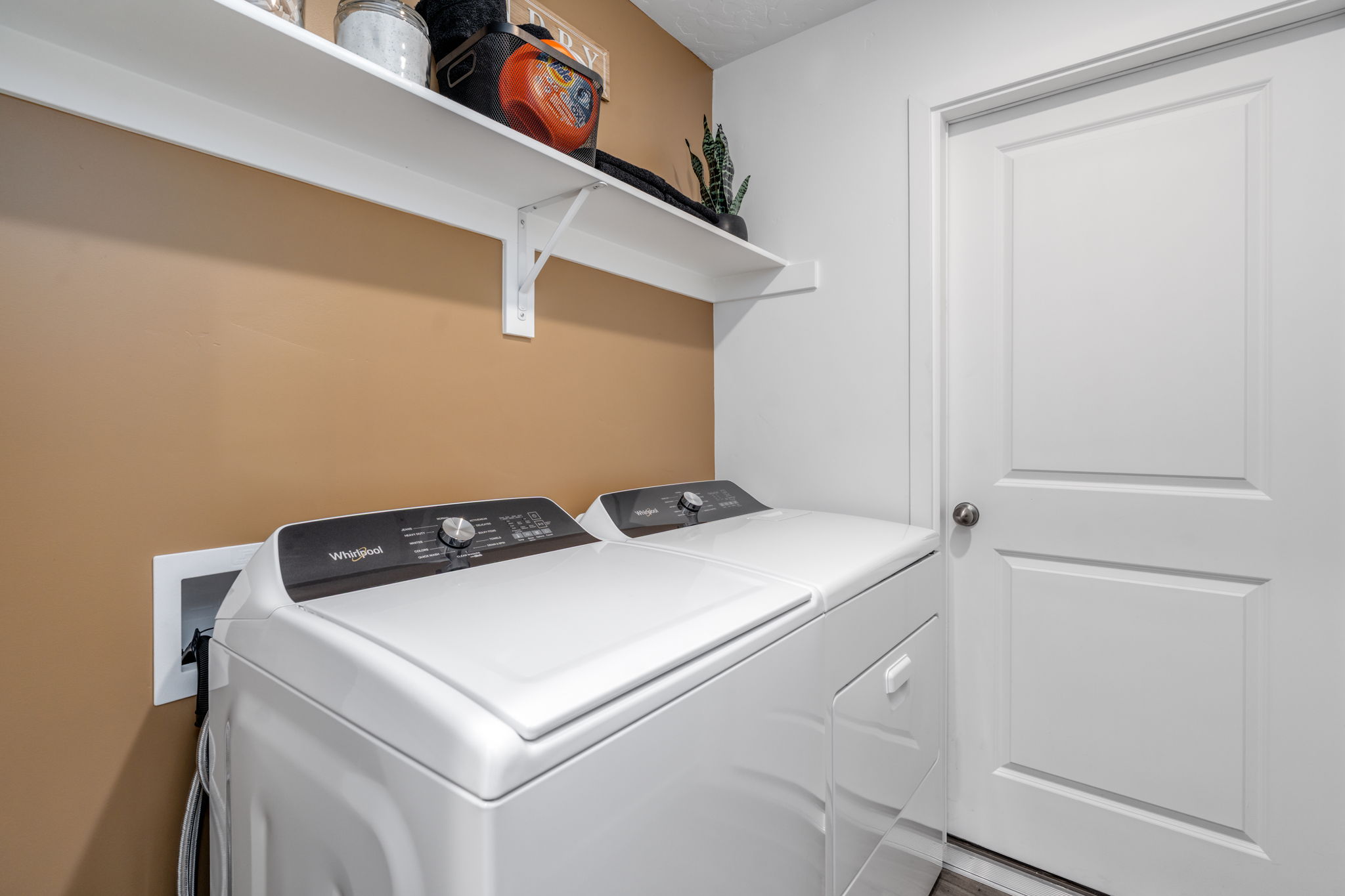 A white laundry machine.