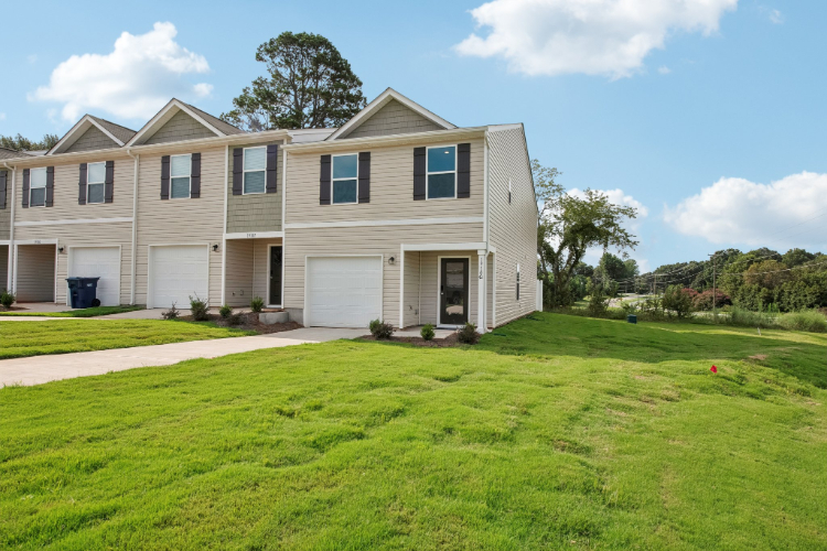 A house with a lawn.