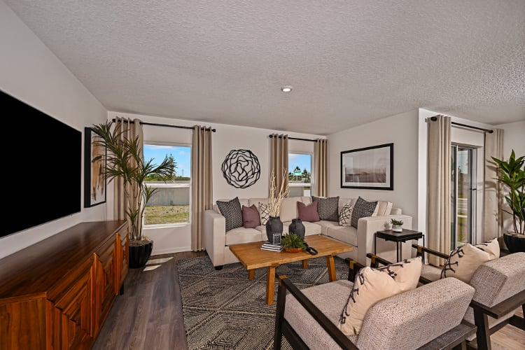 A living room with a large window.