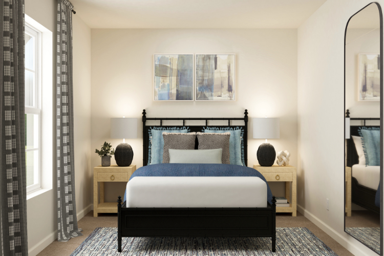 A bedroom with a bed and a mirror.